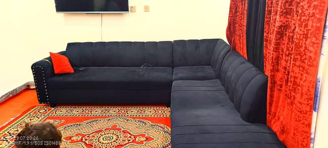 L shape sofa set black colour good condition