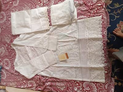 threads and motifs white suit