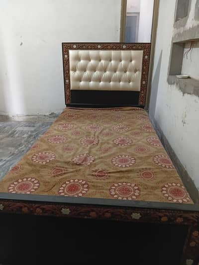 wooden single bed