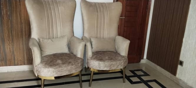 two sitting drawing chairs