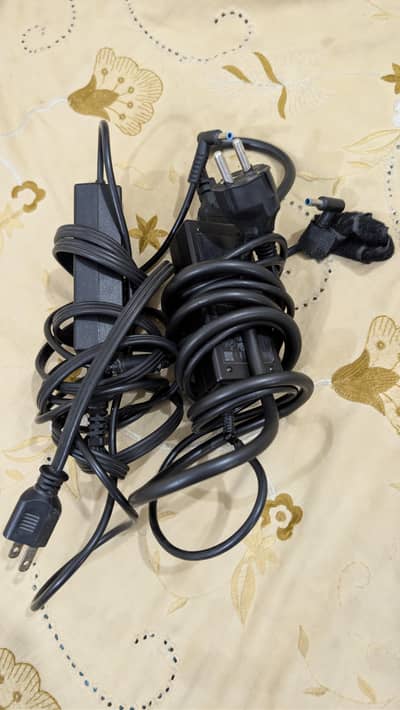 Two HP laptop chargers
