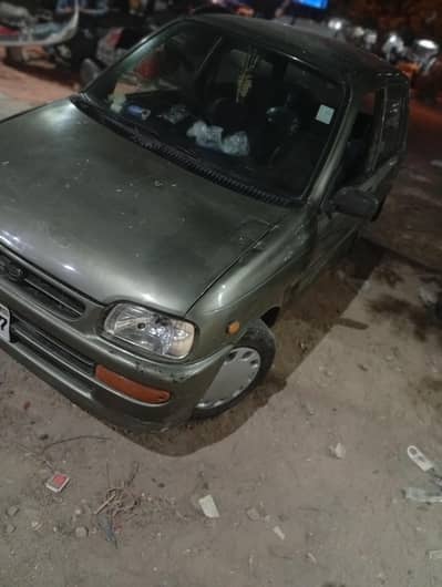 Daihatsu Cuore 2003 inside original outside shower