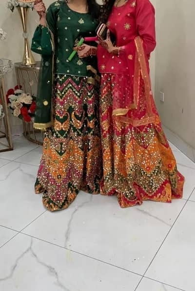 mehndi lehnga available in both colours Green and Pink