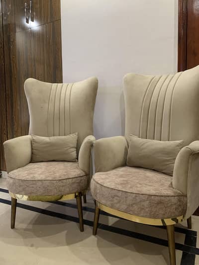 two sitting drawing chairs