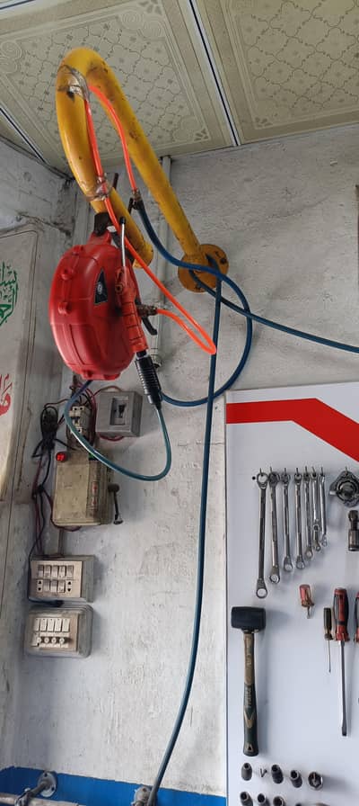 Air pressure gun with holding bar