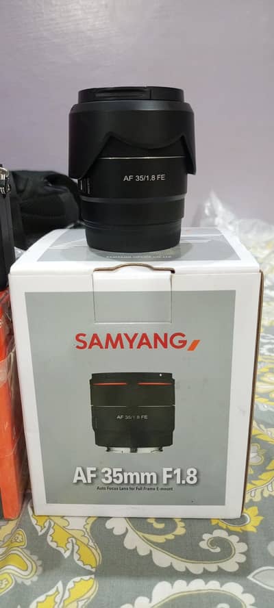 Sony A7 III with lens 35mm 1.8 Samyang