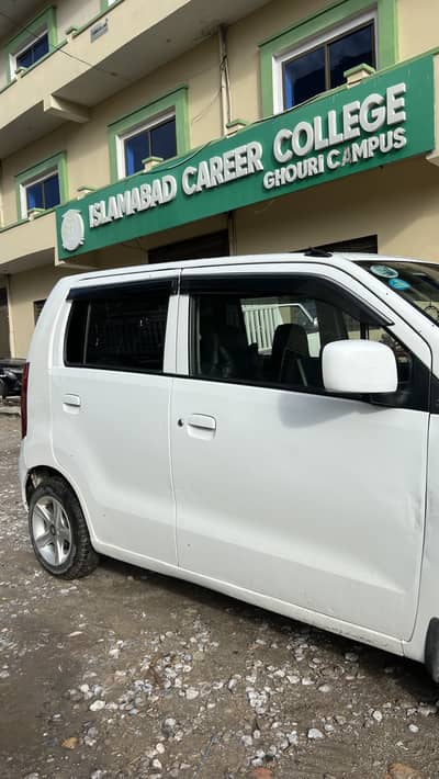 Suzuki Wagon R 2017 white color two pieces touching only