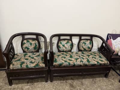 4 seater sofa set with 2 tables.