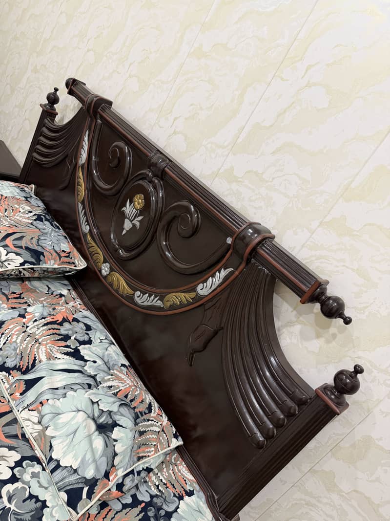 Bed, side table, mattress. 2