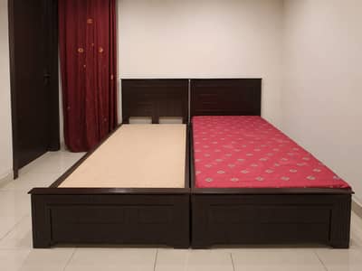 2 Single Beds and One Mattress