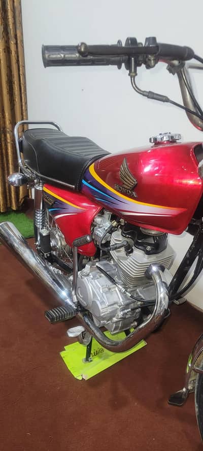 Honda 125 2011 model total genuine 03223104849