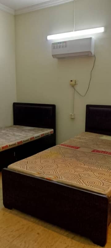 Fully Furnished Room Available For Rent In DHA Phase 1 AC Install