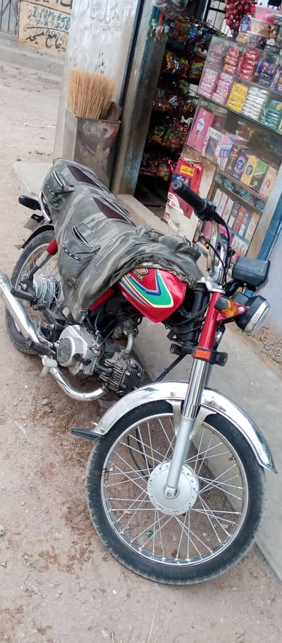 Honda 70cc gari genuine hai koi Kam nhi hai urgent cell krni hai gar k