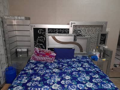 King size bed with 2 side tables . Best wood quality.
