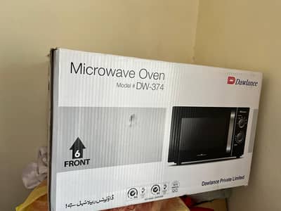 Brand New Dawlance DW-374 Microwave Oven – Box Open Only