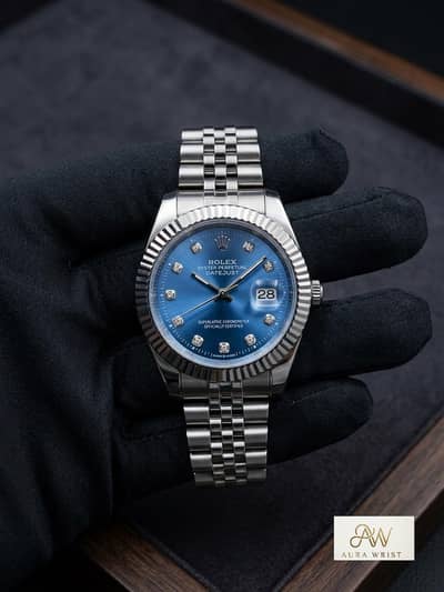 Rolex watch with blue dial , crystal markers