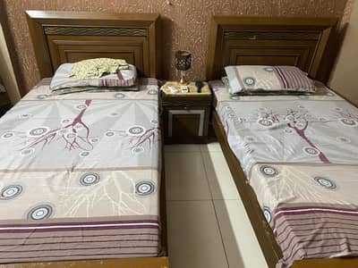 New condition single bed with side table