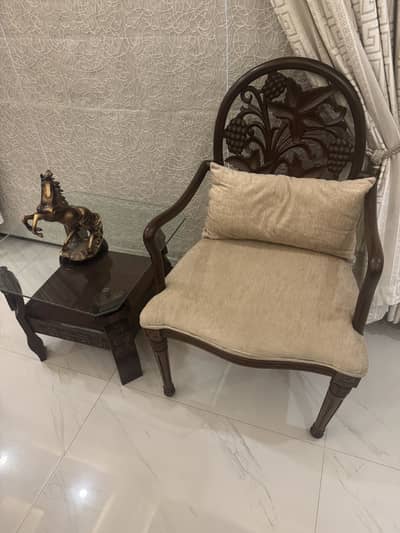 2 wooden chairs with table