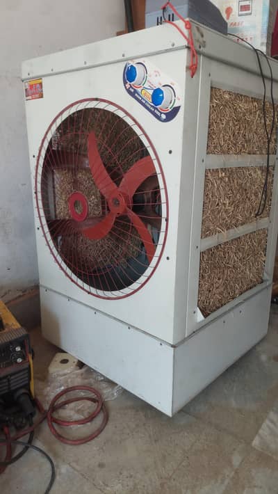 Almost new metal body air cooler dc morot with ac supply.
