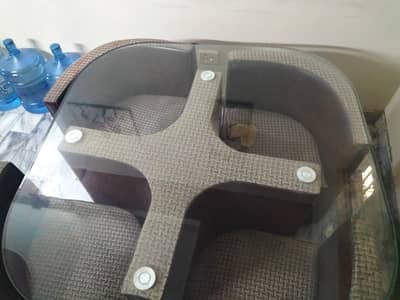 glass dinning table with four chairs