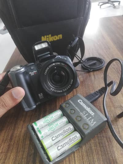 Canon power shot S5 15 8MP with zooming lens