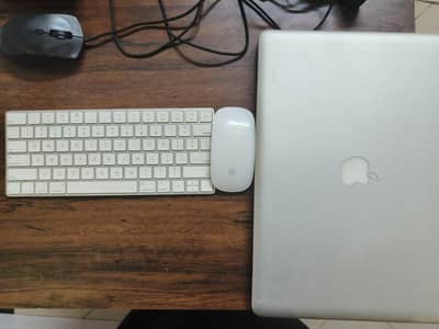 Apple MacBook Pro 15" + Magic Mouse 2 + Apple wireless keyboard