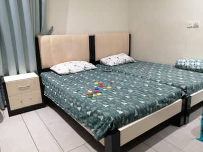 Two single beds along with moltyfoam mattress, sidetable and dressing