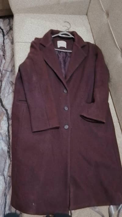 Mahroon coat for women .