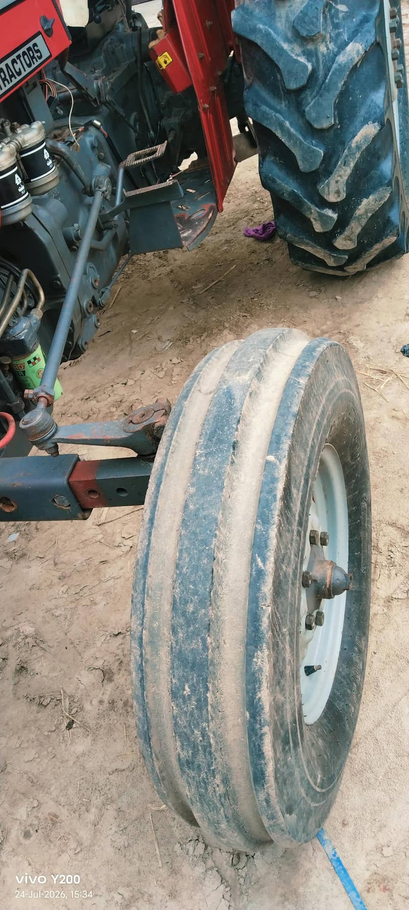 نمبر لگا ہے ال پنجاب کا چھت لگی ہے ٹیر12 آنےرنگ 14آنے انجن مکینیکل اوک 4