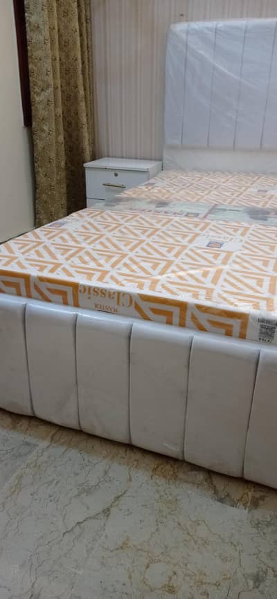 bed with mattress with 2 side table for sell