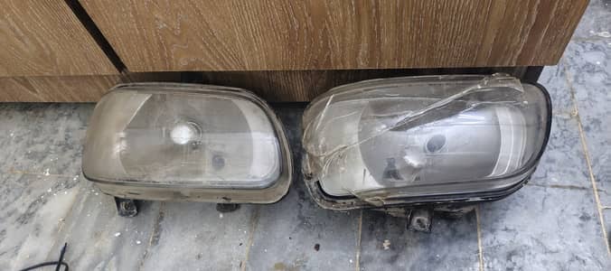 Cuore genuine headlights