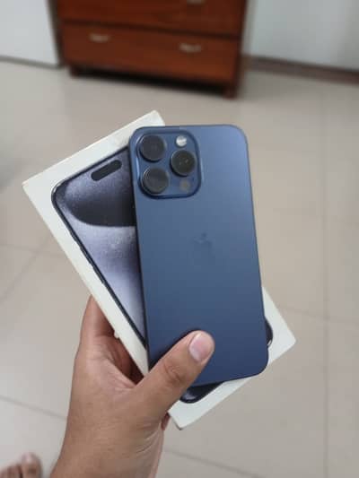 Iphone 15 Pro Max with charger