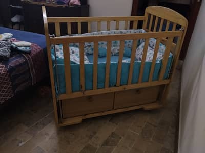 Baby cot is available for sale