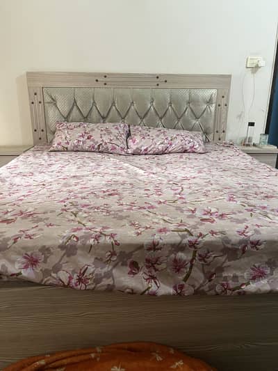 King size bed with 2 side tables and spring mattress