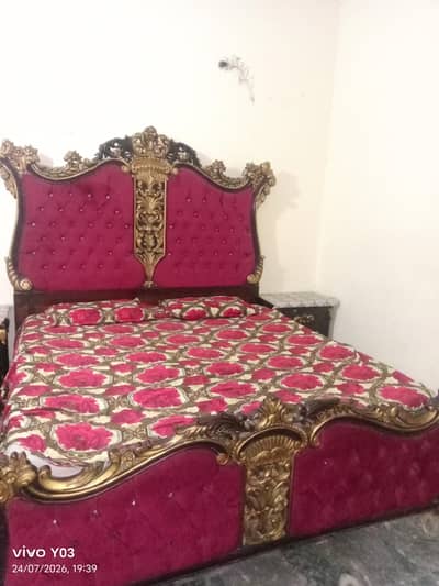 wooden bed with good condition