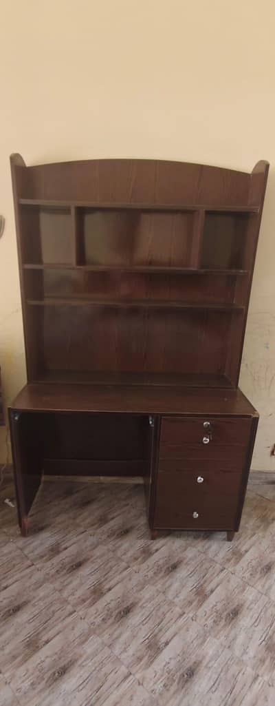 Brown Three Drawer Study Table with Shelves