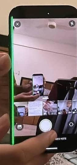 Apple iPhone 15 Pro Max display screen with green line