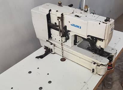 Kach button machine