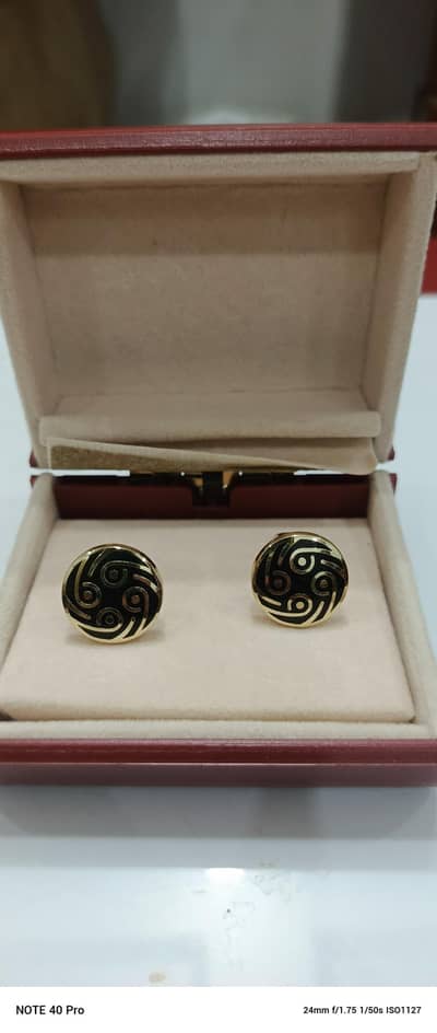 Golden cufflinks