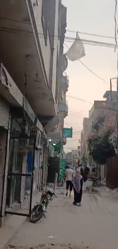 5 marla tripple story corner building near Yateem khana chowk Lahore rental income 2lac plus