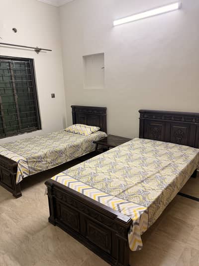 2 Single beds 2 seater sofa 3 tables