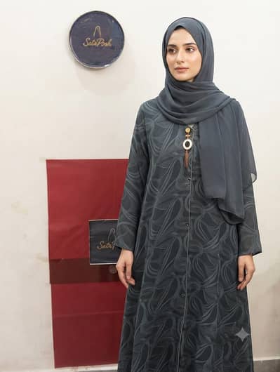 ​beautiful NIDA fabric abaya