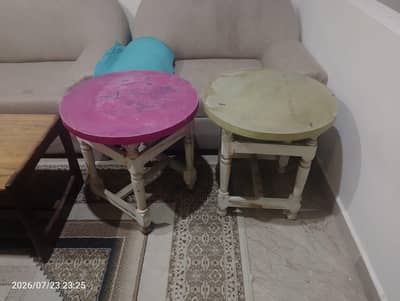 3 wooden round tables are available