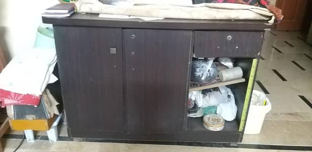 iron table + enough space for books , files , groceries, etc