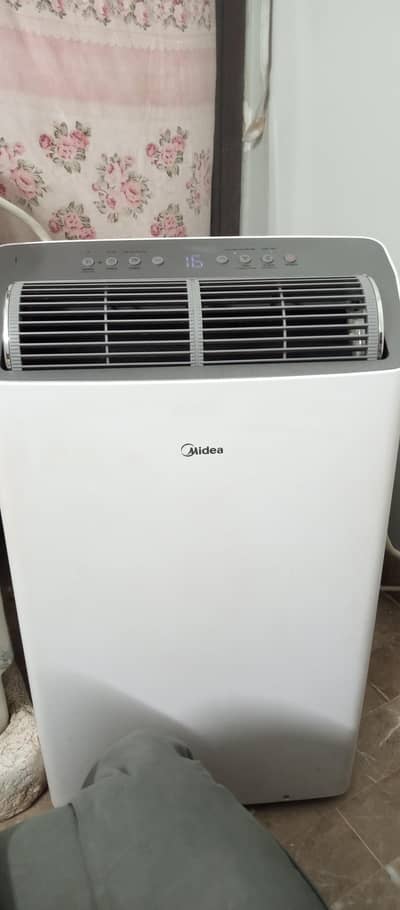Midea 1.2 portable inverter AC in new condition