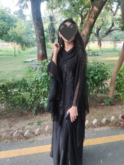 black asymmetrical dress hand work