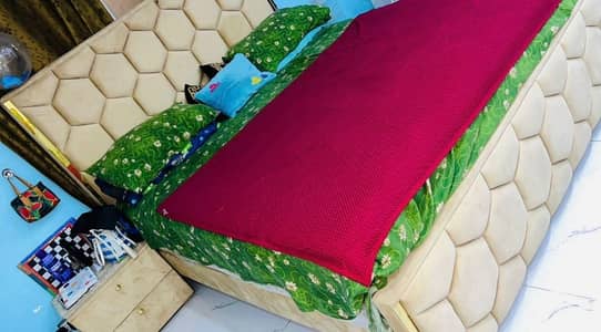 wooden bed with side tables dressing table