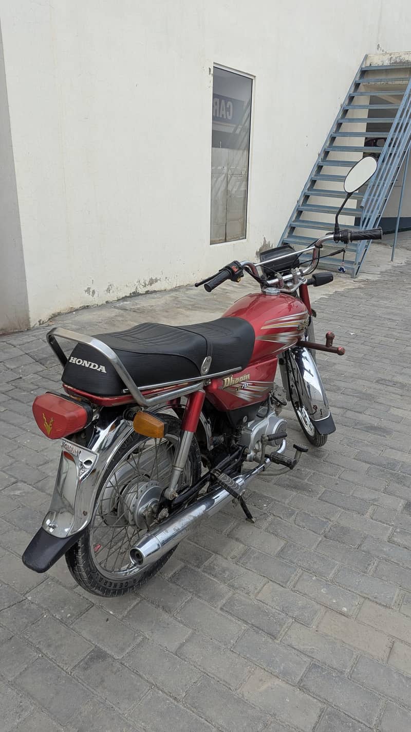 Dhoom 70cc 4