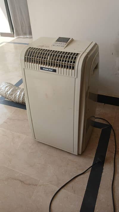 NIKAI 1 Ton Portable AC (12000 BTU) – Used