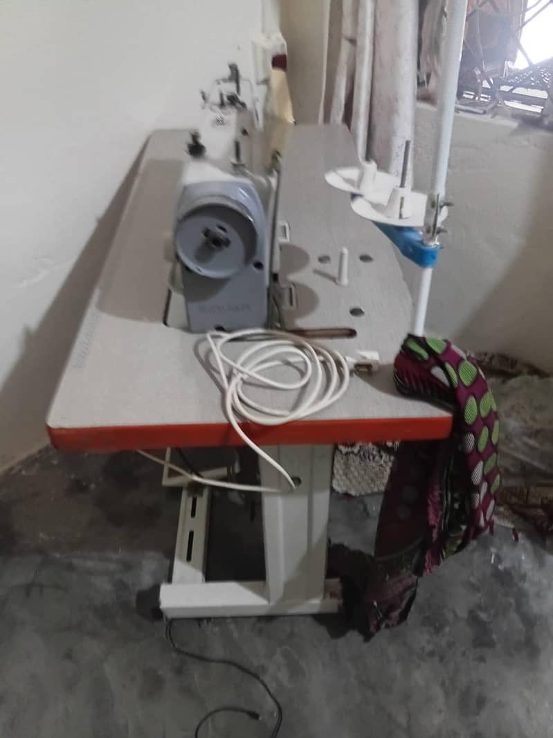 singer machine 2